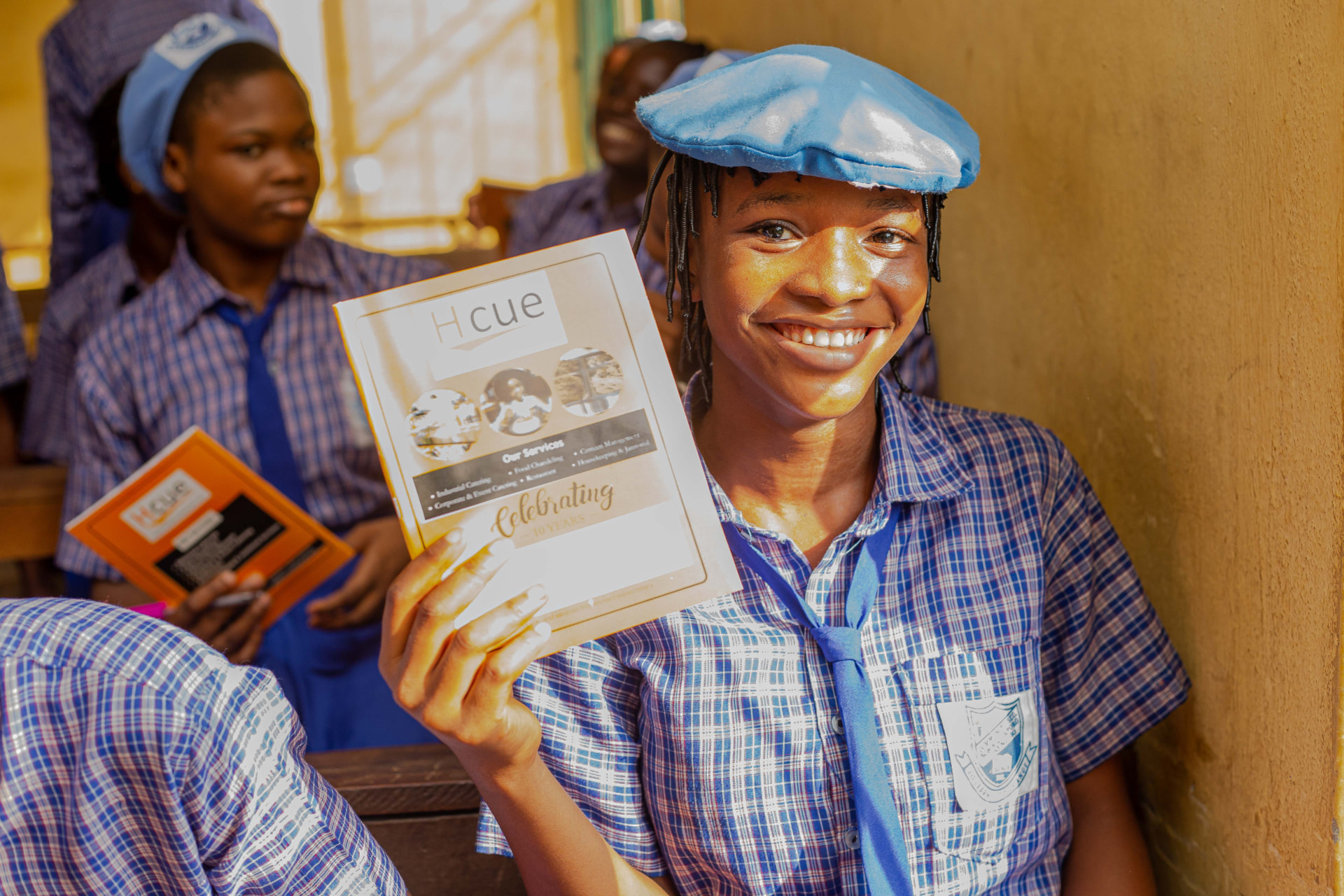 CSR 2024 — H-CUE Branded Notebooks Distribution to Schools